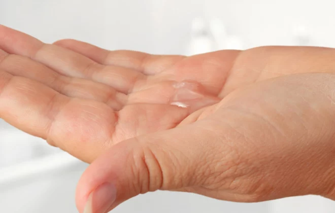 Close of hand with hand gel in palm